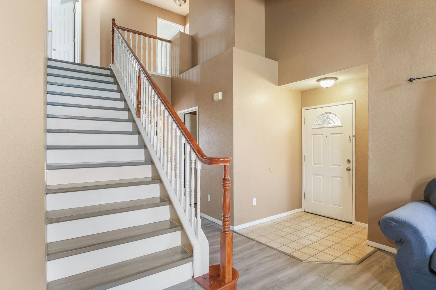 810 River Raft Court Modesto, CA 95351 - Photo 4 of 32 a view of entryway bedroom and hall with wooden floor