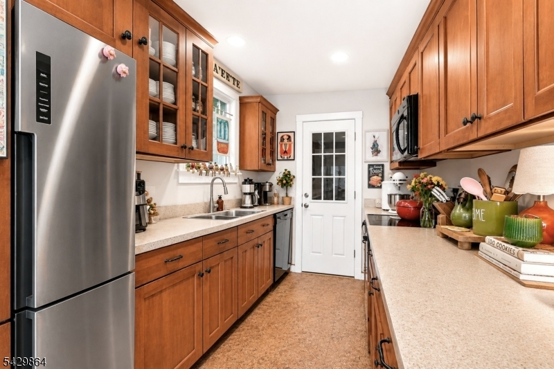 77 Lower North Shore Road Branchville, NJ 07826 - Photo 14 of 38 a kitchen with stainless steel appliances granite countertop a refrigerator and a sink