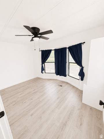 131 Rickie Road Washington, UT 84780 - Photo 24 of 31 Room featuring light wood-finish flooring and a ceiling fan with integrated lighting