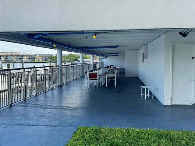 a view of a swimming pool outdoor seating area