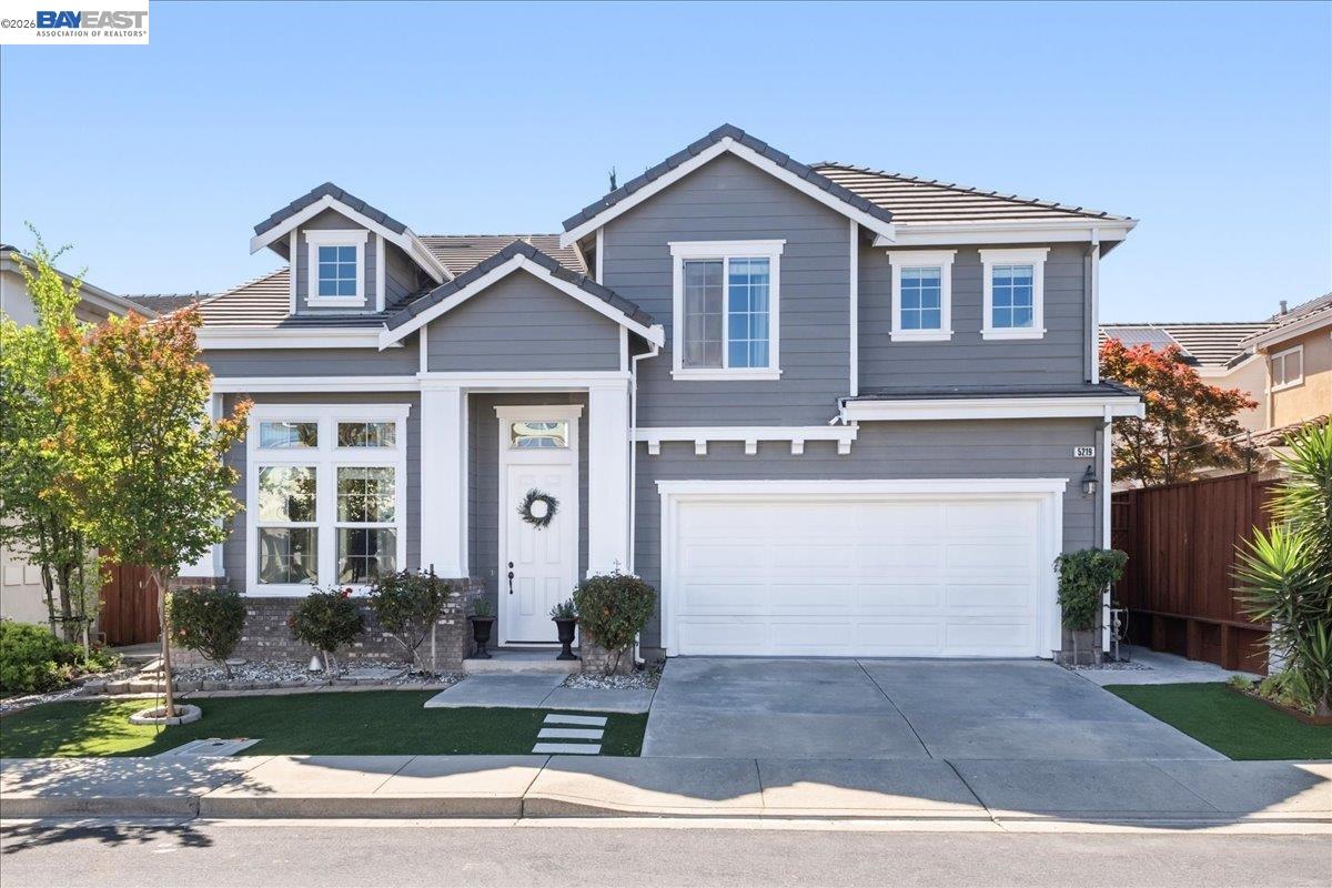 5219 North Forestdale Circle Dublin, CA 94568 - Photo 1 of 1 a front view of a house with a yard and garage