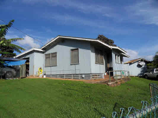 4786 Nonou Road Kapaa, HI 96746 - Photo 17 of 18 a front view of house with yard