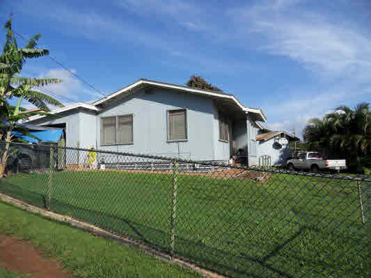 4786 Nonou Road Kapaa, HI 96746 - Photo 18 of 18 a front view of a house with a garden