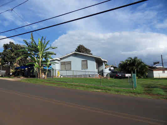 4786 Nonou Road Kapaa, HI 96746 - Photo 2 of 18 a view of a house with a yard and large trees