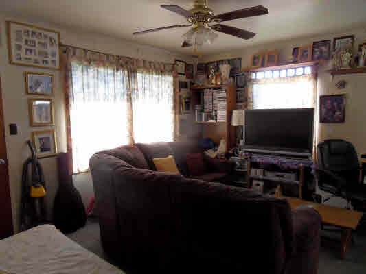 4786 Nonou Road Kapaa, HI 96746 - Photo 8 of 18 a living room with furniture and a flat screen tv