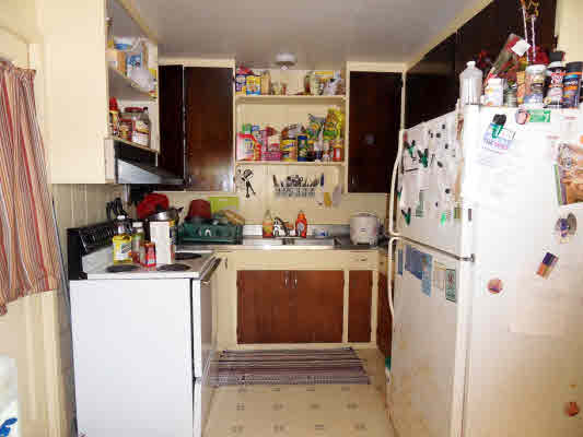 4786 Nonou Road Kapaa, HI 96746 - Photo 10 of 18 a kitchen with stainless steel appliances a refrigerator and a stove top oven