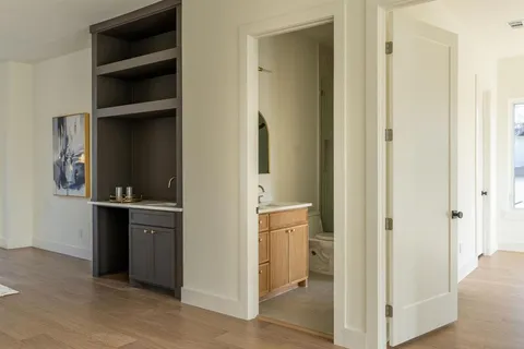 a view of cabinets and utility room