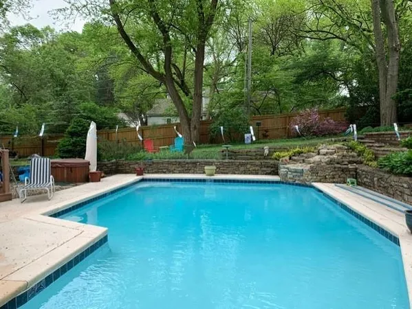 $995,000 | 8728 Meadow Lane, Leawood, KS 66206