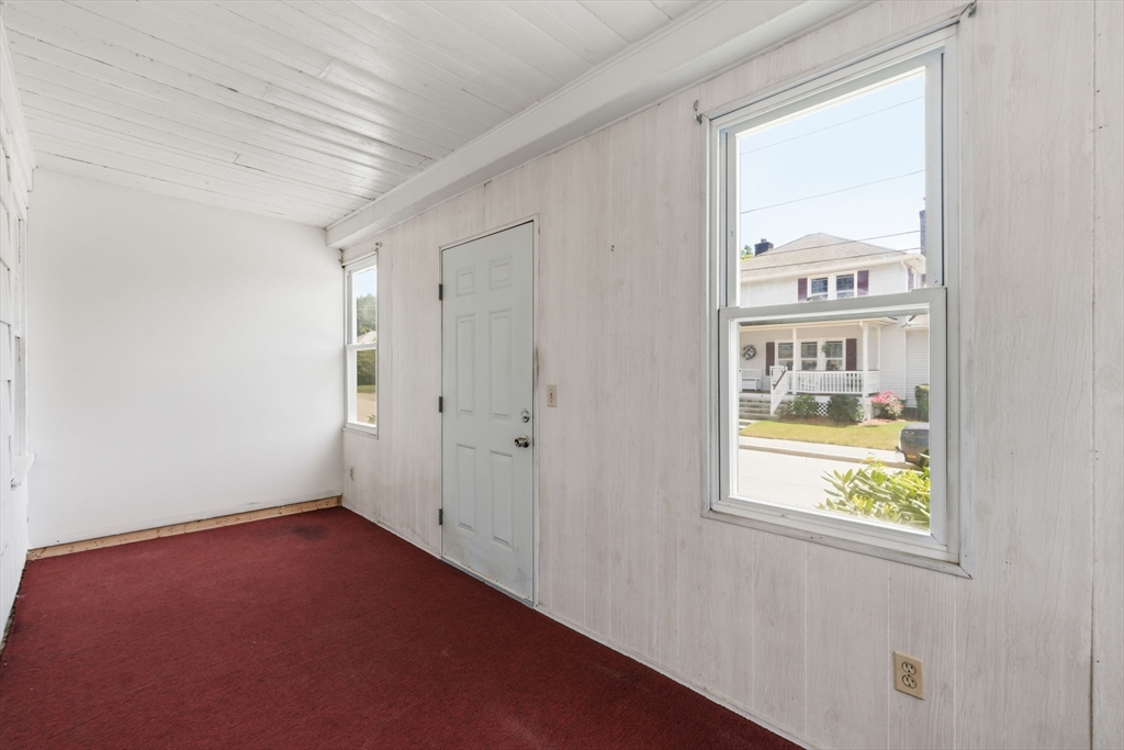 17 Rollinson Road Worcester, MA 01606 - Photo 5 of 41 a view of an empty room with a window