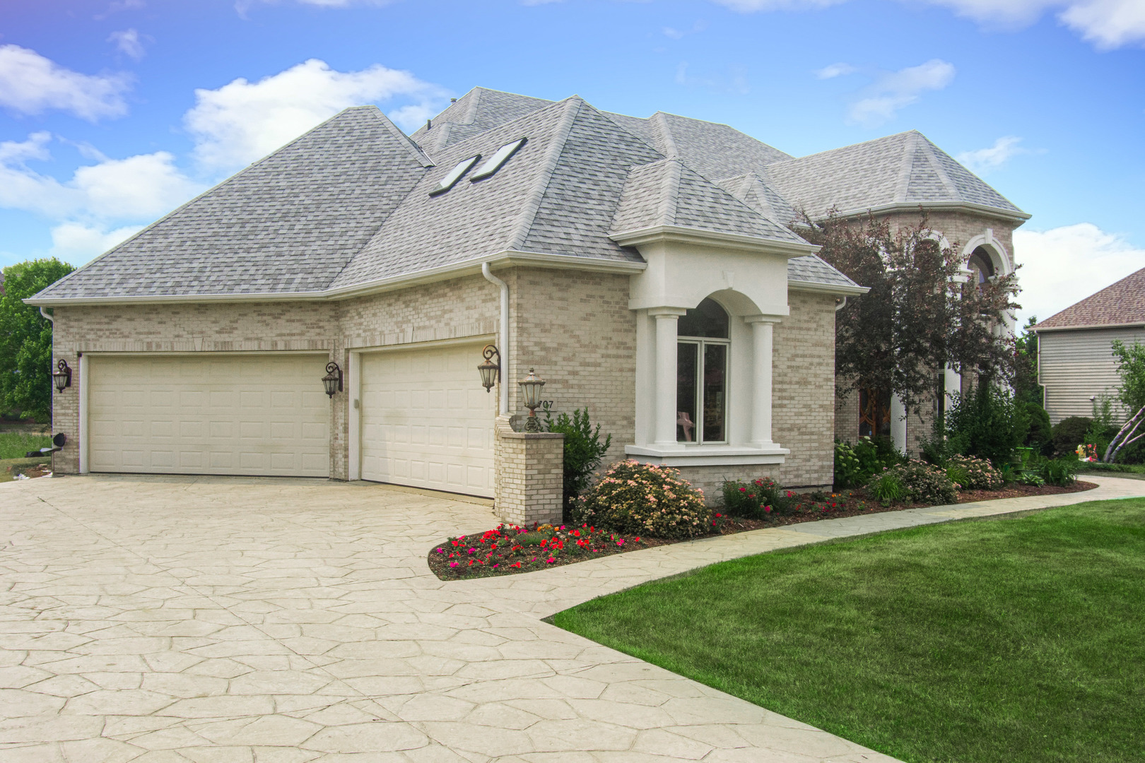 707 Lusted Lane Batavia, IL 60510 - Photo 1 of 1 a front view of a house with a garden
