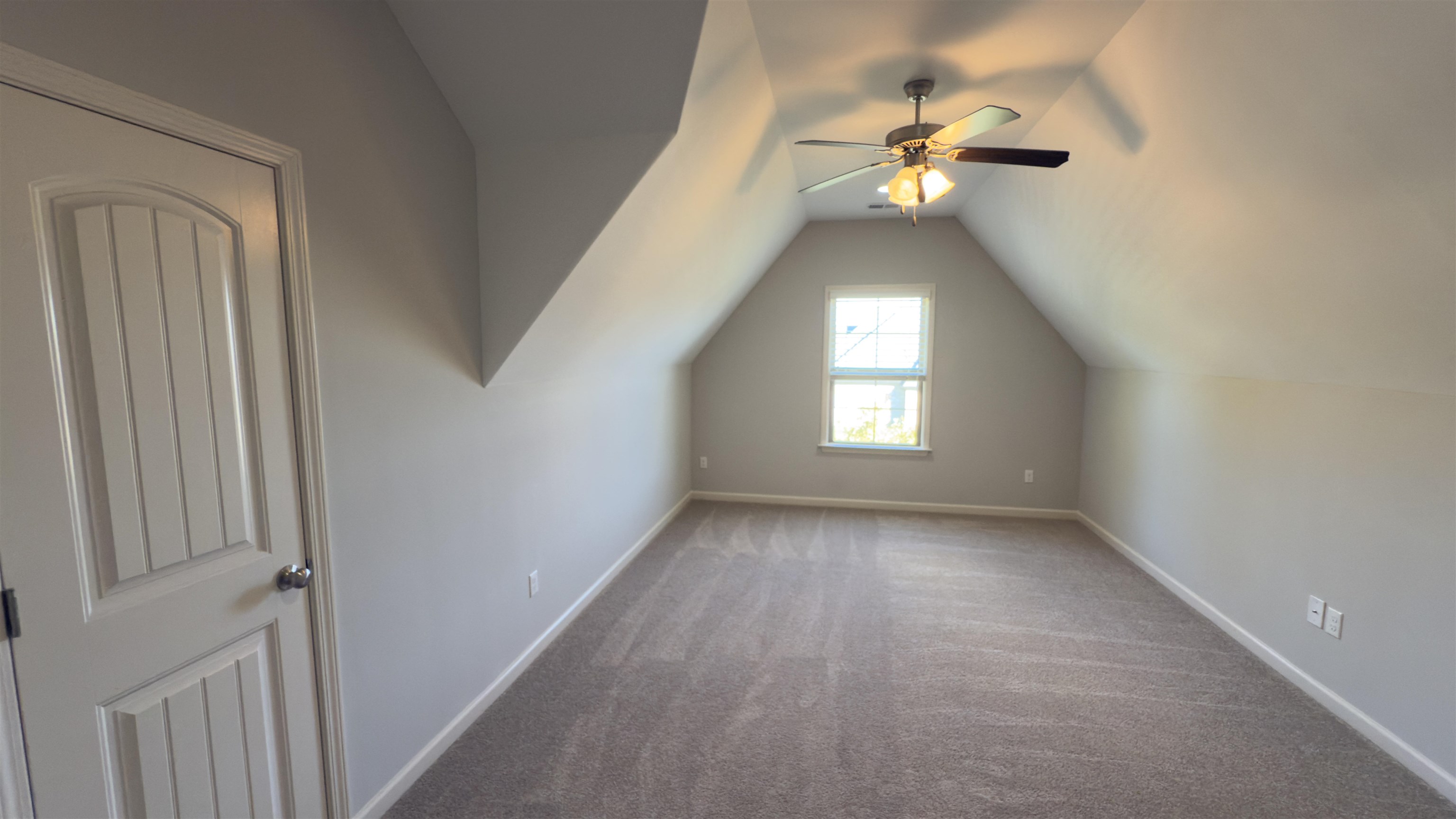 1217 Pilgrim Ridge Road Collierville, TN 38017 - Photo 27 of 33 Bonus room featuring carpet, lofted ceiling, and ceiling fan