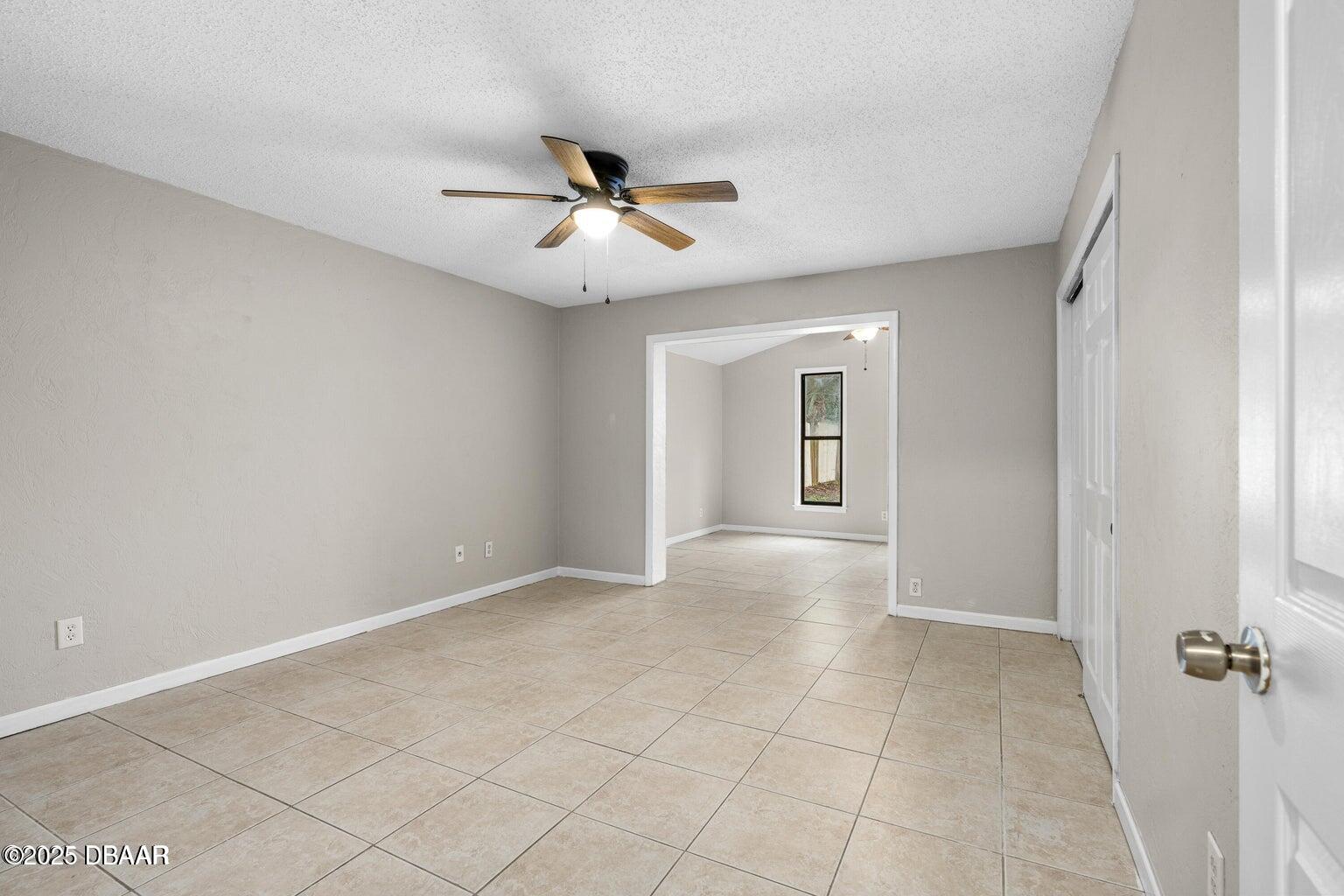 1702 Carolina Avenue Ormond Beach, FL 32174 - Photo 15 of 23 a view of an empty room with a window