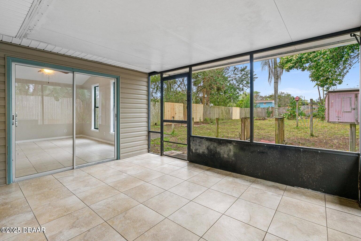 1702 Carolina Avenue Ormond Beach, FL 32174 - Photo 19 of 23 a view of an empty room and window