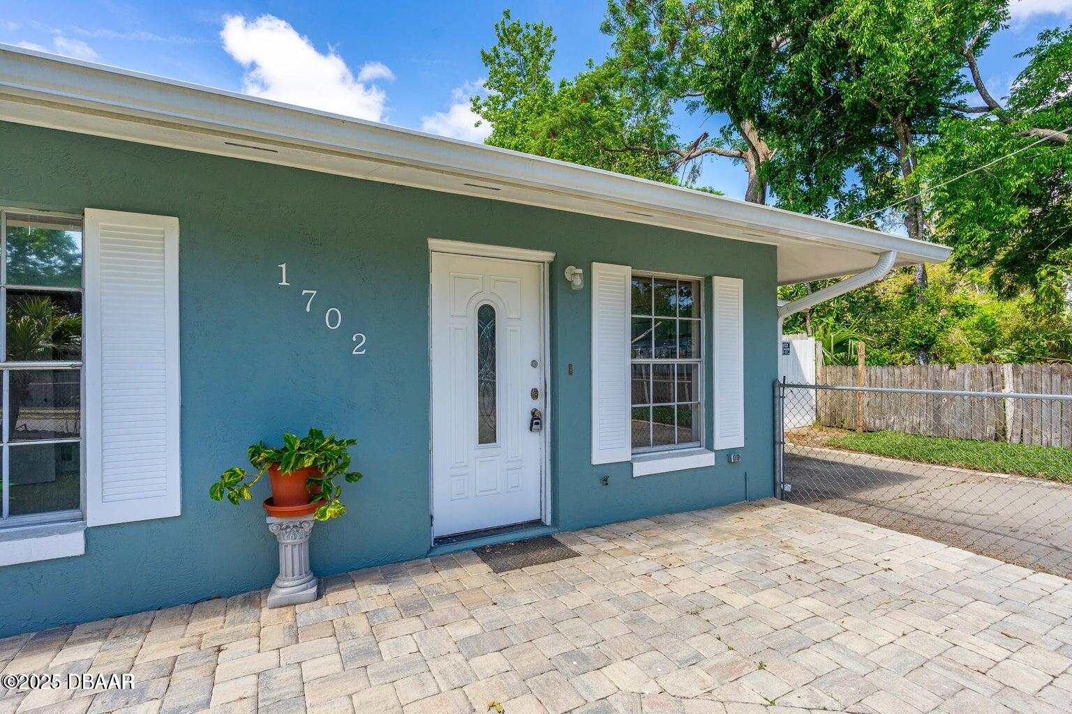 1702 Carolina Avenue Ormond Beach, FL 32174 - Photo 2 of 23 a view of a house with a backyard