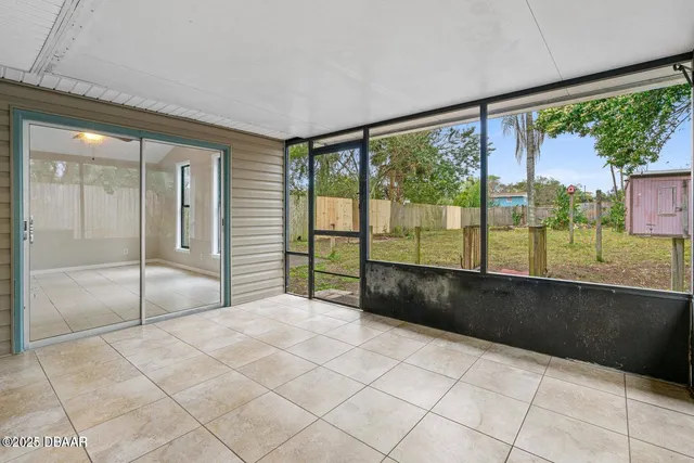 a house with trees in the background