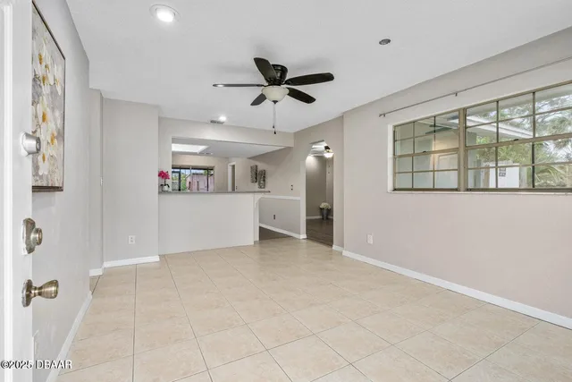a view of a kitchen with a sink and a window