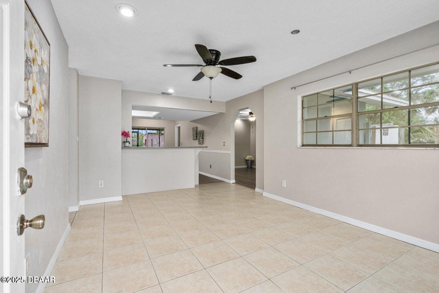 1702 Carolina Avenue Ormond Beach, FL 32174 - Photo 3 of 23 a view of a kitchen with a sink and a window