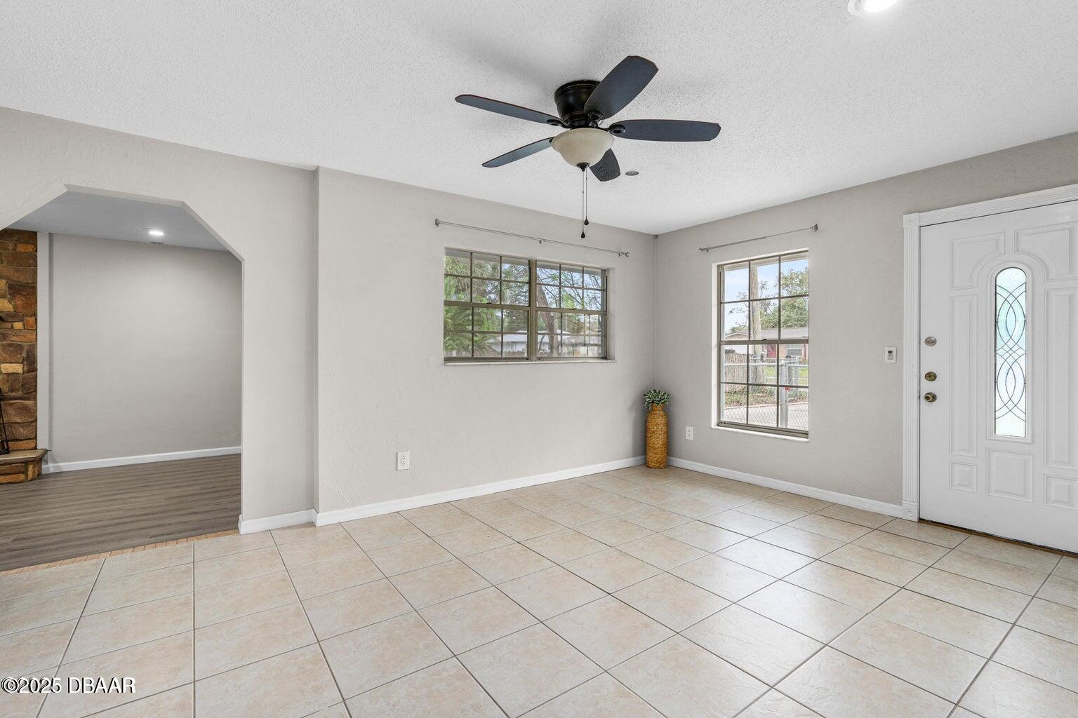 1702 Carolina Avenue Ormond Beach, FL 32174 - Photo 5 of 23 a view of an empty room with a window