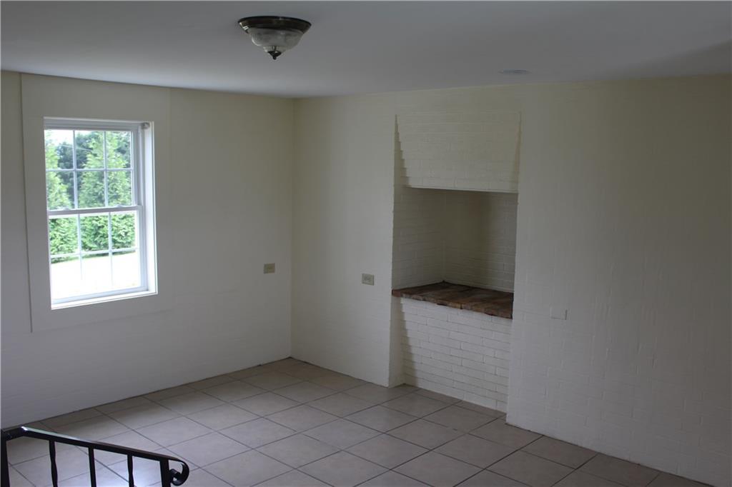 4123 Hickory Nut Ridge Road Hudson, NC 28638 - Photo 2 of 27 an empty room with a window