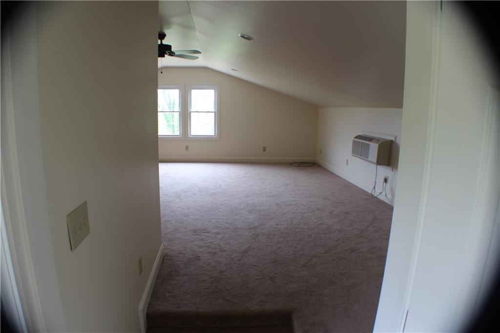 4123 Hickory Nut Ridge Road Hudson, NC 28638 - Photo 13 of 27 an empty room with windows