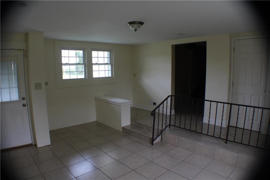 4123 Hickory Nut Ridge Road Hudson, NC 28638 - Photo 3 of 27 a view of a room with washing machine