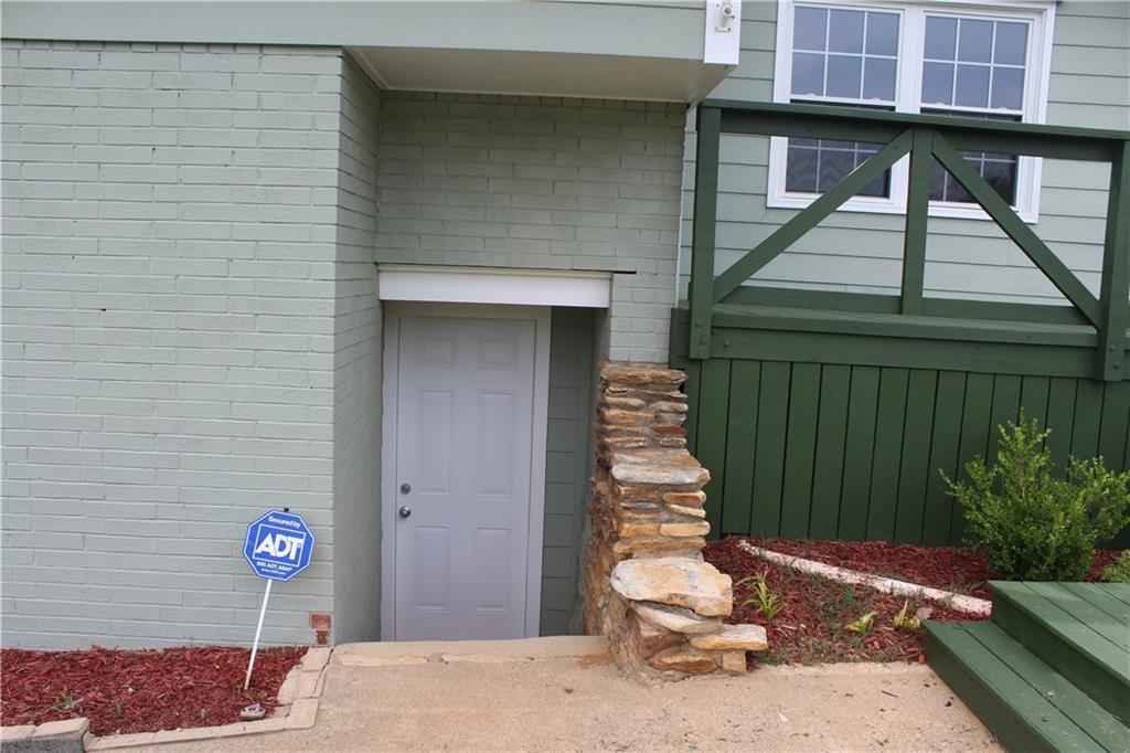 4123 Hickory Nut Ridge Road Hudson, NC 28638 - Photo 22 of 27 a backyard of a house with seating space