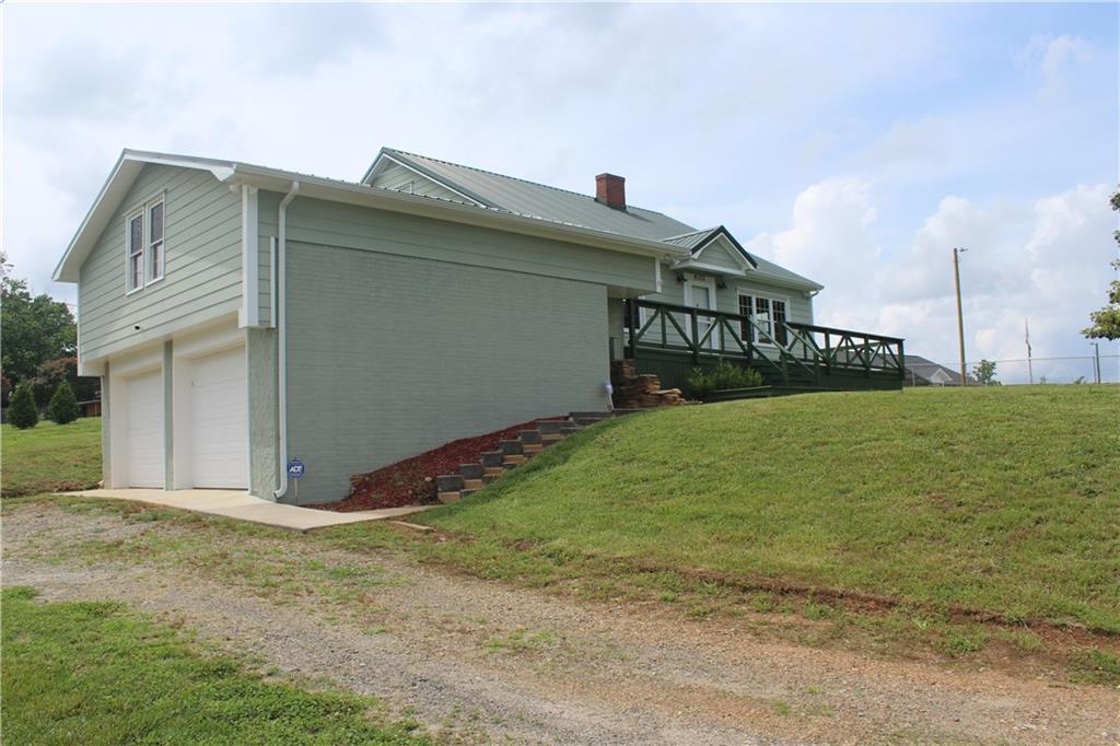 4123 Hickory Nut Ridge Road Hudson, NC 28638 - Photo 24 of 27 a front view of house with yard