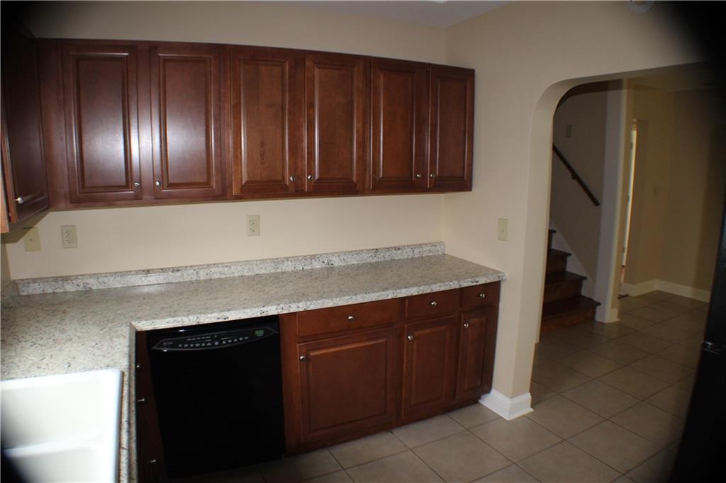 4123 Hickory Nut Ridge Road Hudson, NC 28638 - Photo 6 of 27 a kitchen with a sink and cabinets