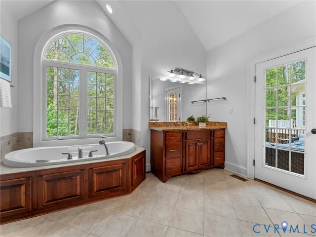 a front view of house with yard and outdoor seating