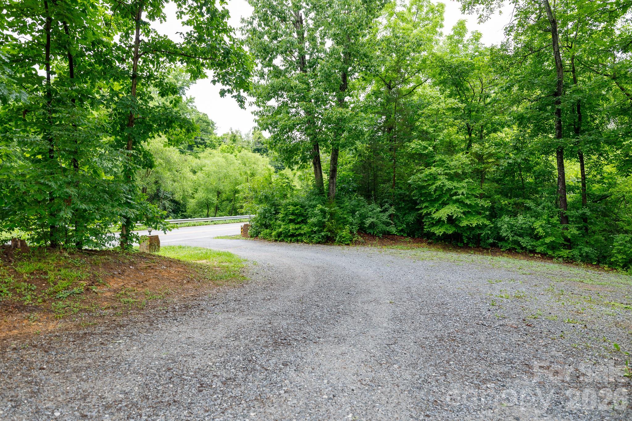 652 Sutton Spring Road York, SC 29745 - Photo 18 of 28 a view of a yard with a tree