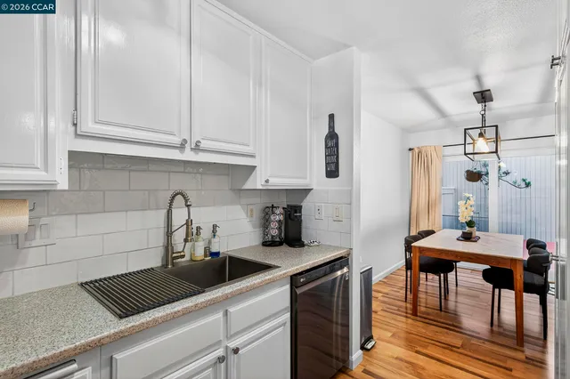 a view of bathroom with washer and dryer