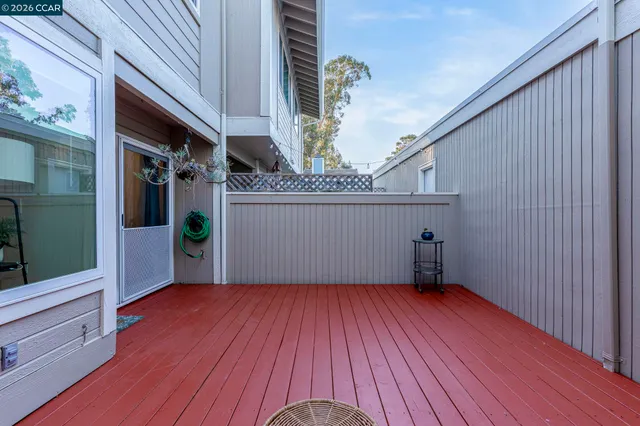 a view of a chairs in wooden deck