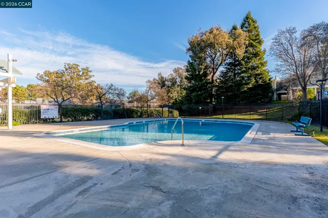a view of a house with a yard and garden