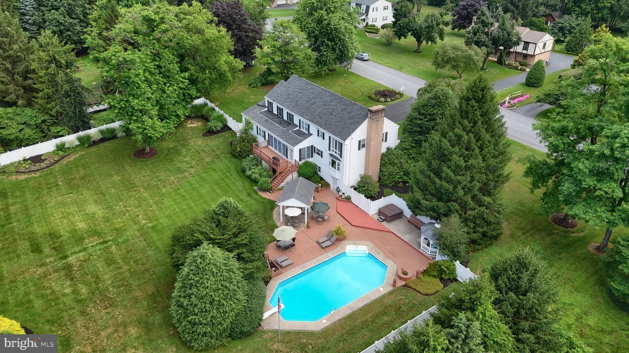 an aerial view of a house with a garden