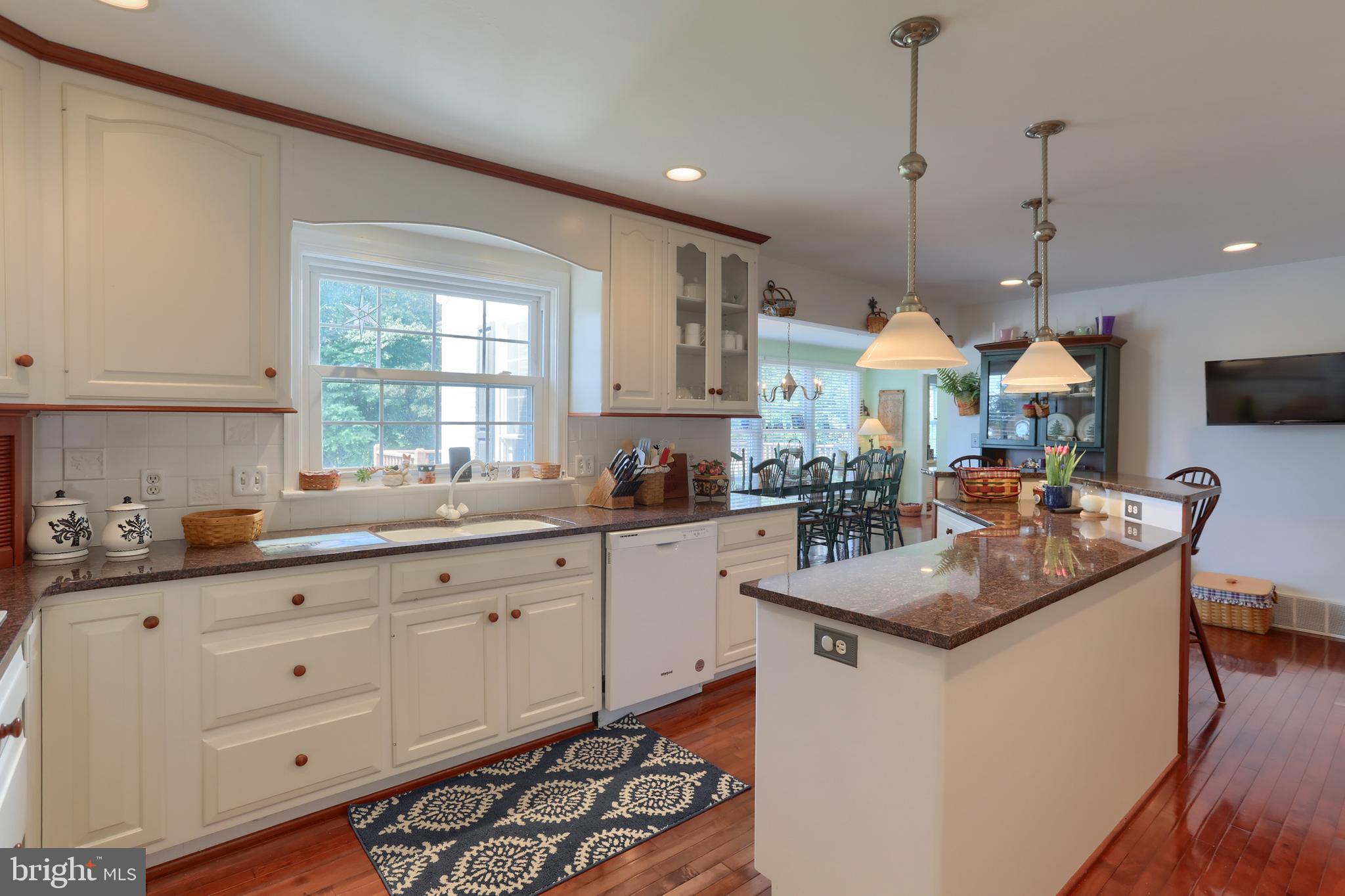 3 Banbury Road Hummelstown, PA 17036 - Photo 21 of 85 a kitchen with stainless steel appliances granite countertop a sink a stove and a wooden floors