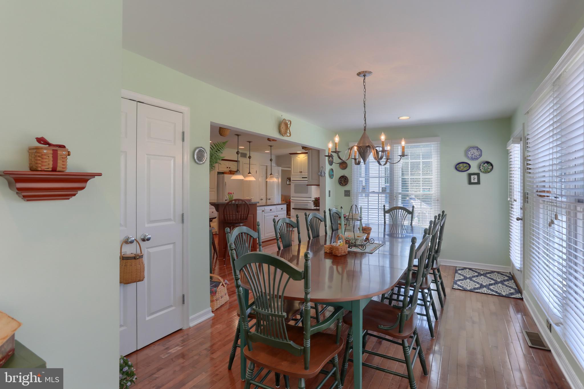 3 Banbury Road Hummelstown, PA 17036 - Photo 26 of 85 a dining room with furniture a chandelier and wooden floor