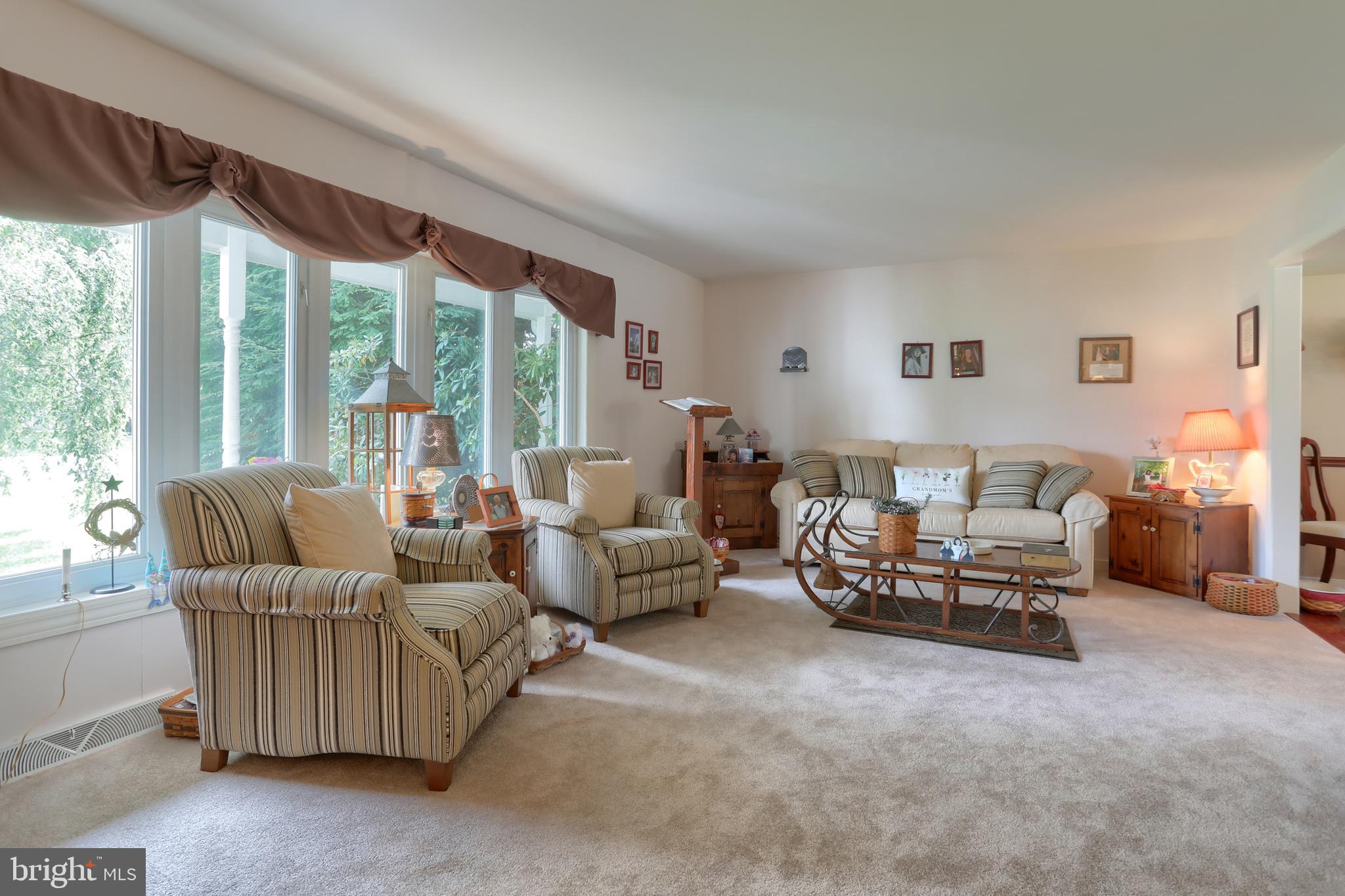 3 Banbury Road Hummelstown, PA 17036 - Photo 28 of 85 a living room with furniture and a large window
