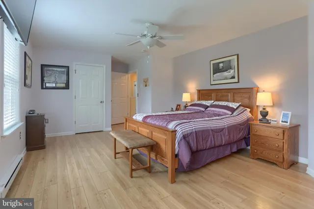 a view of balcony with wooden floor and fence