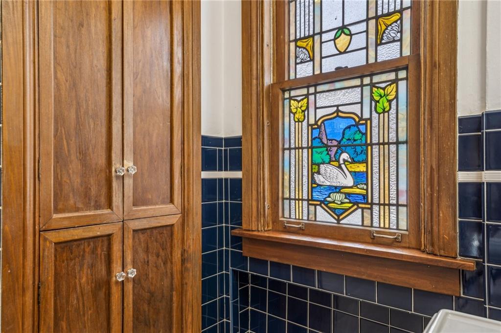 252 Arden Road Pittsburgh, PA 15216 - Photo 23 of 31 Beautiful stained glass adds character. And plenty of storage too!