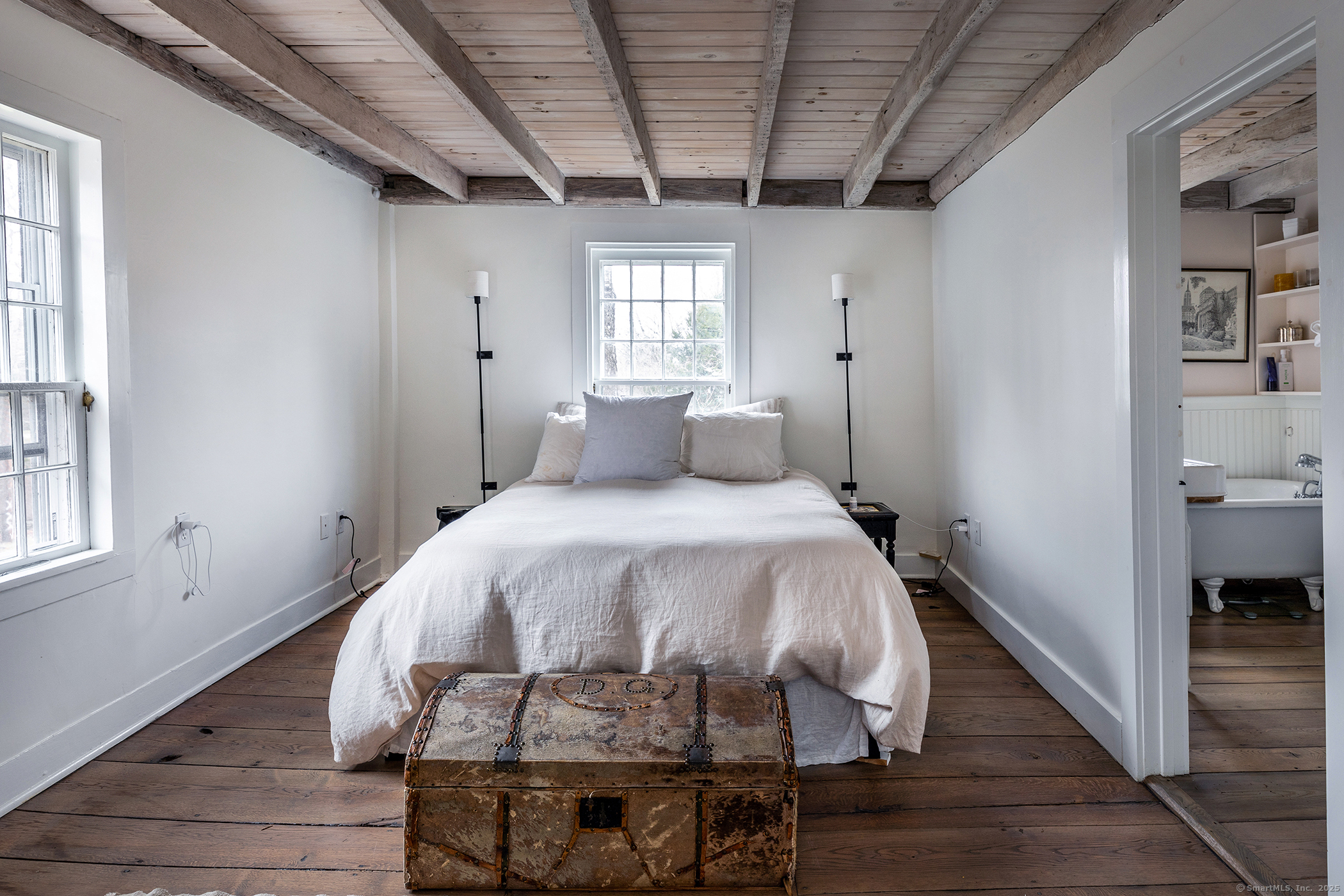 37 South Street Roxbury, CT 06783 - Photo 11 of 20 a bedroom with a bed and wooden floor