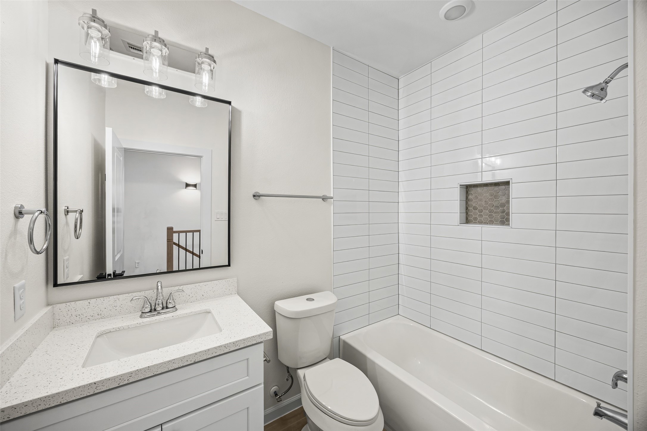 443 Hahlo Street Houston, TX 77020 - Photo 17 of 27 a bathroom with a toilet a sink a mirror and bathtub