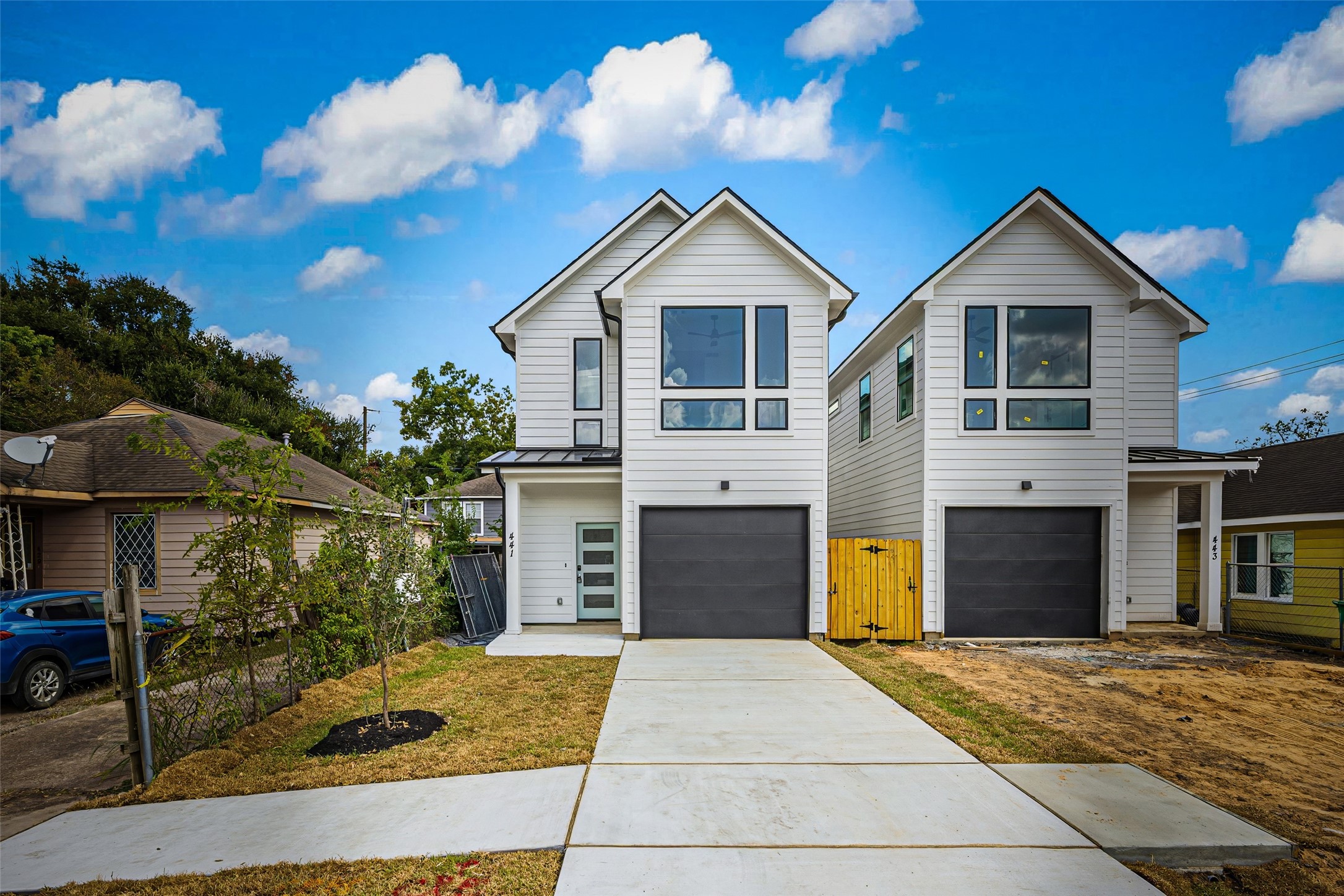 443 Hahlo Street Houston, TX 77020 - Photo 2 of 27 a front view of a house with a yard and garage