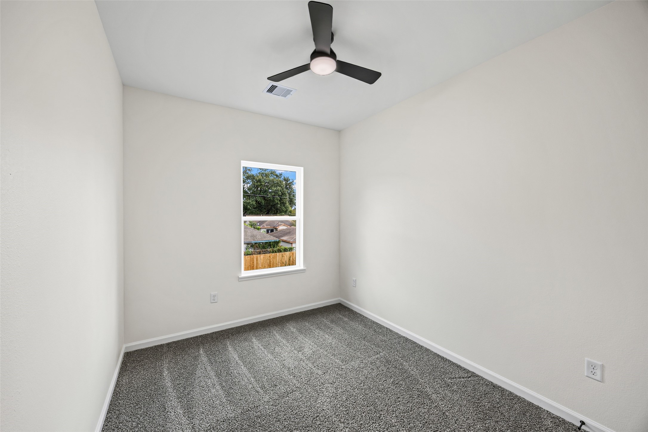 443 Hahlo Street Houston, TX 77020 - Photo 24 of 27 a view of an empty room with a window