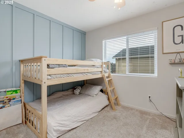 a room with a table and windows