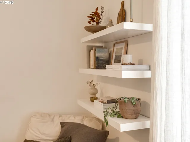 a room with a table and chandelier