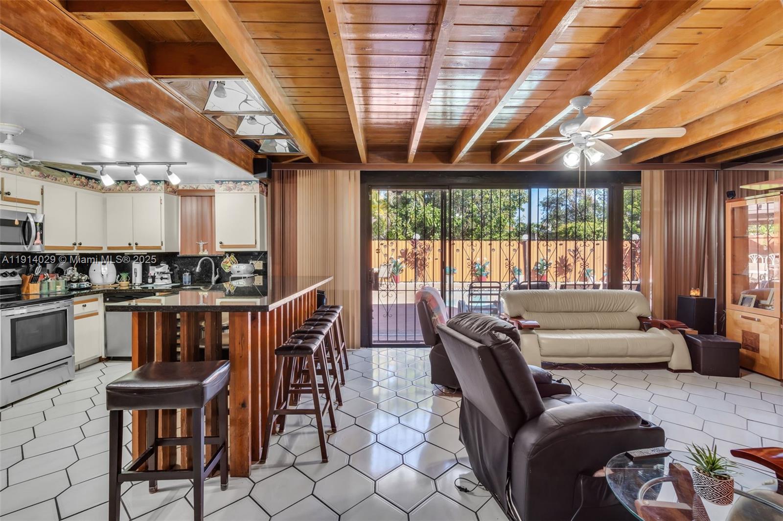1861 Southwest 19th Street Miami, FL 33145 - Photo 11 of 38 a view of a dining room with furniture window and outside view
