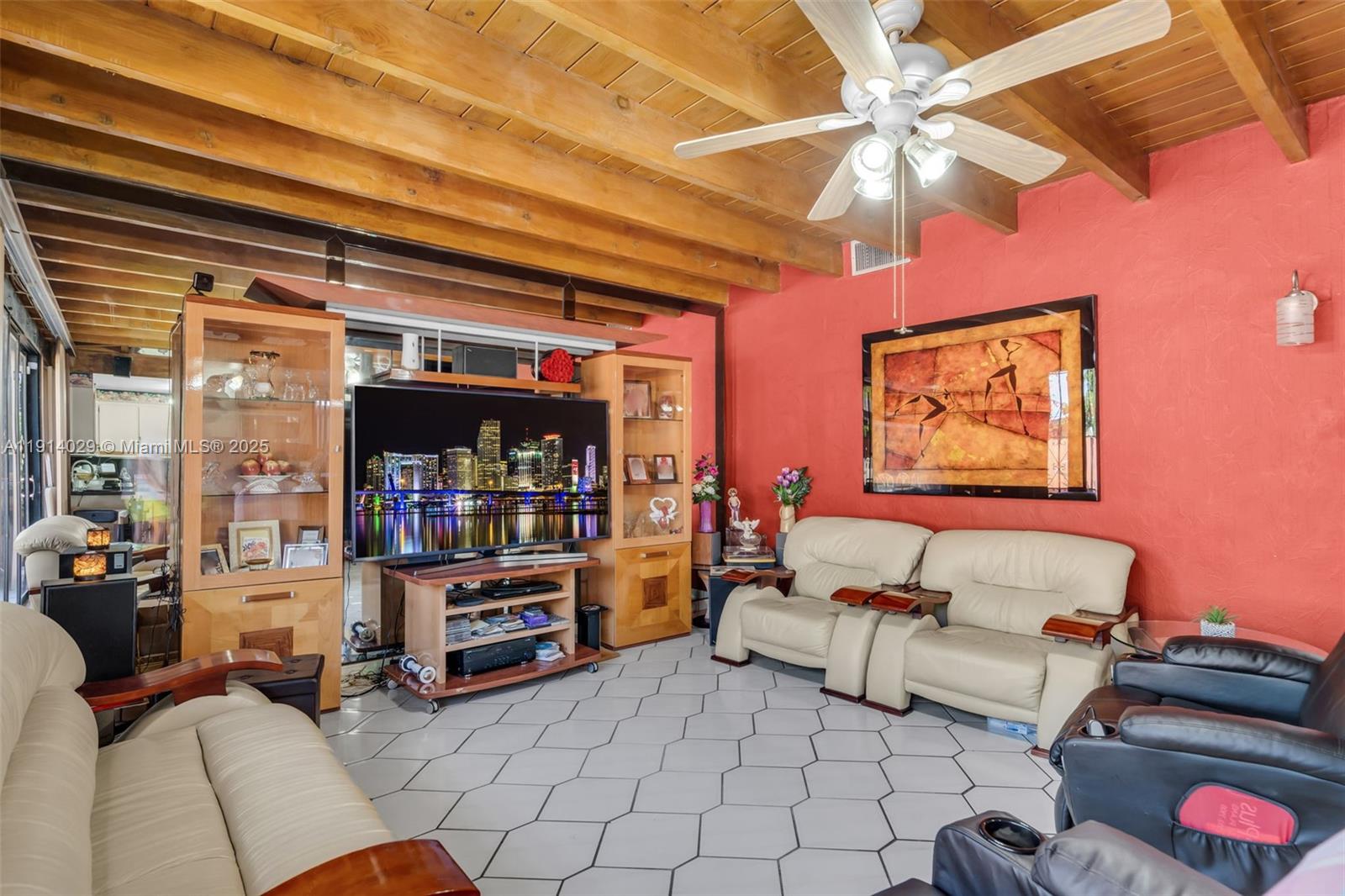 1861 Southwest 19th Street Miami, FL 33145 - Photo 13 of 38 a living room with furniture and a flat screen tv