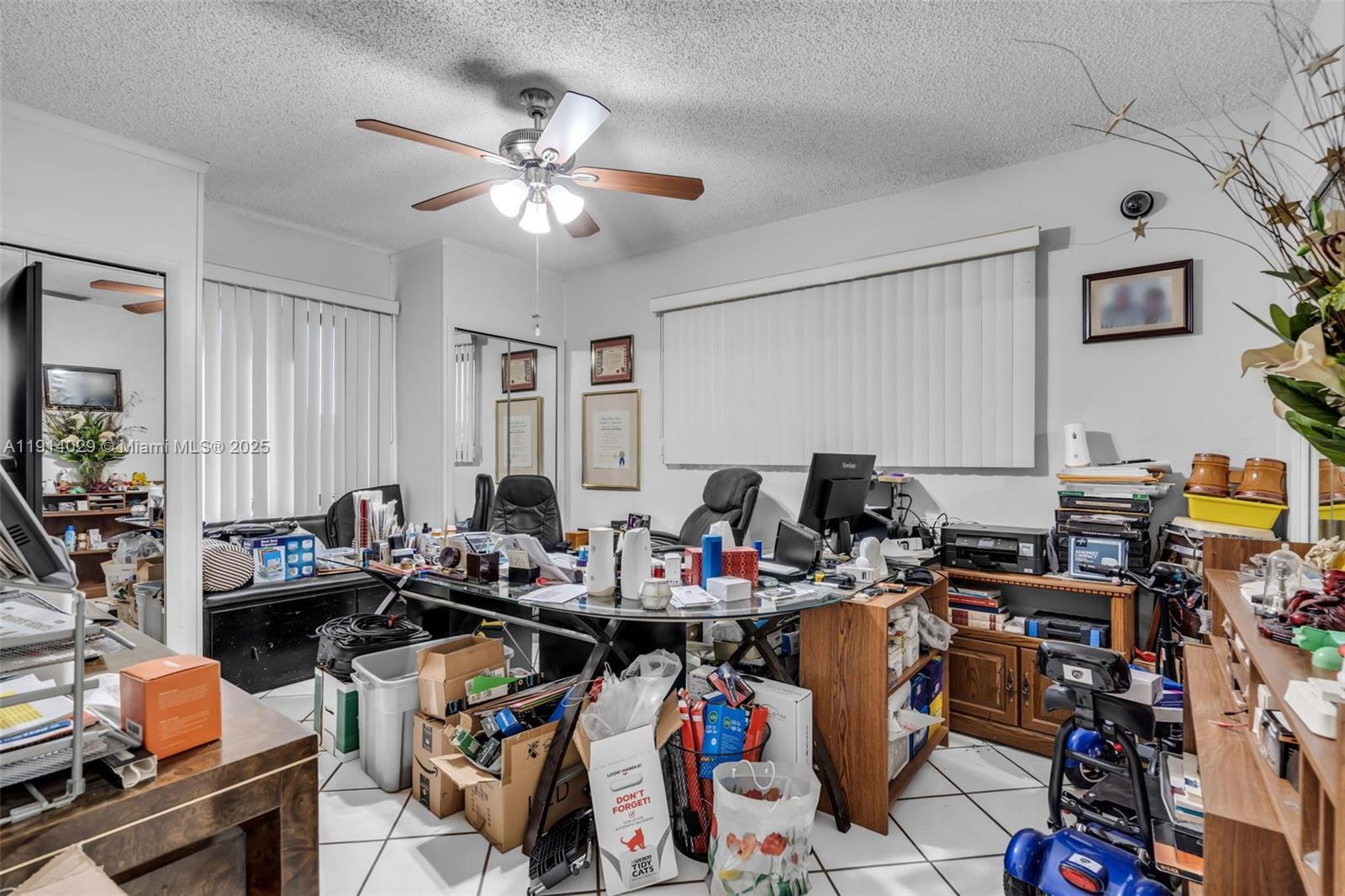 1861 Southwest 19th Street Miami, FL 33145 - Photo 17 of 38 a room with gym equipment and a window