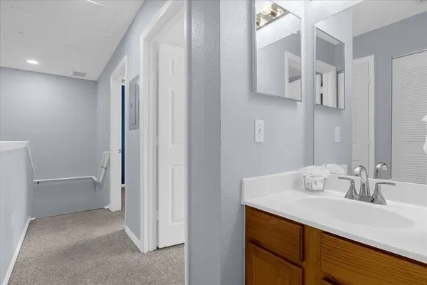 a bathroom with a sink and a toilet