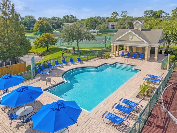 an aerial view of a house with a lake view